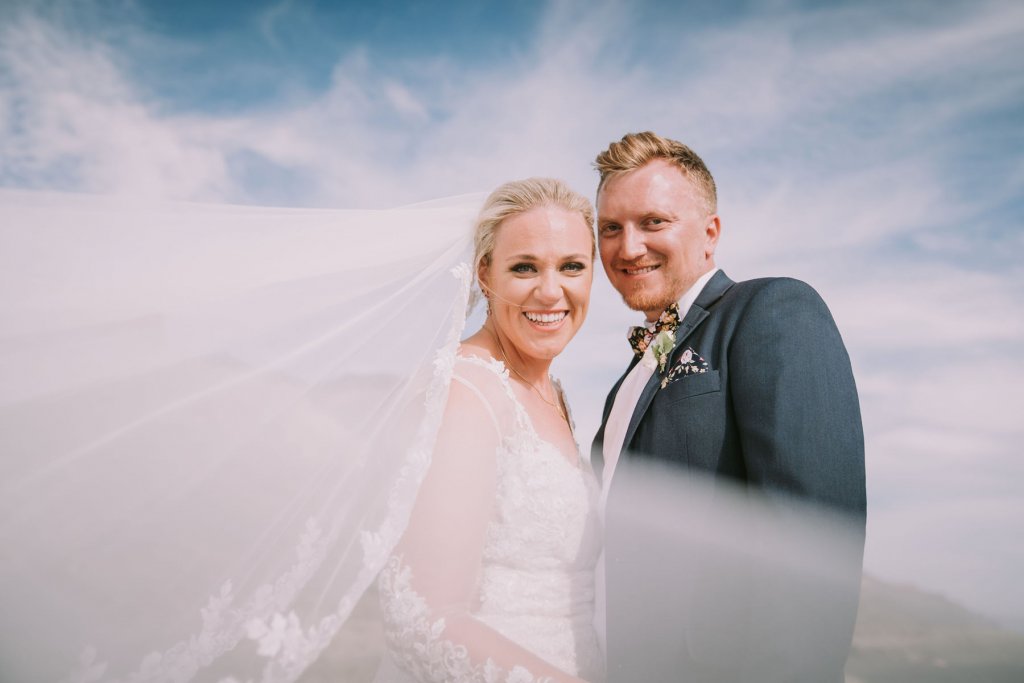 Real Bride Jamielle wearing her Custom Harriett Falvey Wedding Dress and Veil Made in New Zealand